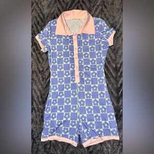 Cute. Sexy. Comfy. One piece button down romper shorts. Large, but run small.